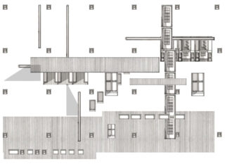 Architektonischer Grundriss mit einer linearen Anordnung rechteckiger Räume und Korridore, durchschnitten von verschiedenen Trennwänden und schattierten Abschnitten mit beschrifteten Rasterpunkten.