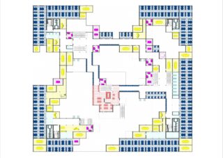 Grundriss mit einem zentralen offenen Bereich, umgeben von Reihen blauer Arbeitsplätze, gelben Besprechungsräumen, rosa Zimmern, Treppen und Korridoren, die alle Seiten verbinden.
