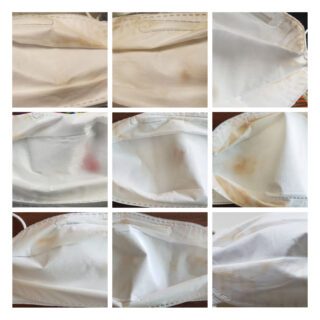 Eine Collage aus neun Nahaufnahmen, die die Innenseite gebrauchter weißer Gesichtsmasken zeigen, jede mit sichtbaren Flecken und Verfärbungen.