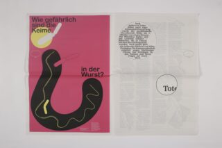 Eine Zeitungsseite mit einer Grafik einer Wurst und Bakterien sowie einem deutschen Text mit der Frage „Wie gefährlich sind die Keime in der Wurst?“ („Wie gefährlich sind die Keime in der Wurst?“).