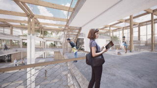 Innenansicht eines modernen, offenen mehrstöckigen Gebäudes mit Holzbalken, interagierenden Menschen, einer Frau, die ein Tablet verwendet, und großen Fenstern, die natürliches Licht hereinlassen.